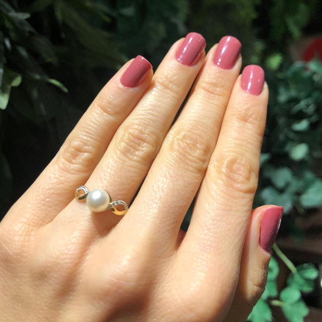 ANEL COM PEROLA E DIAMATES